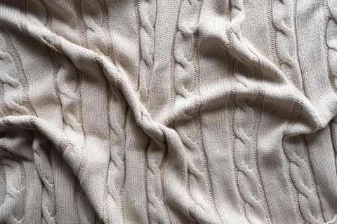 Texture gray knitted fabric with a pattern Stock Photos