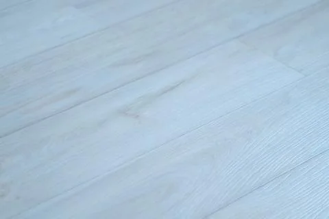 The texture of gray linoleum surface on the floor with wooden pattern. Stock Photos