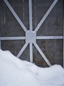 Texture of a gray metal grate with various elements Fotos de archivo