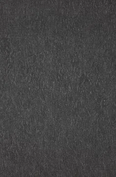 Texture of gray paper on the wall. Abstract background. Stock Photos
