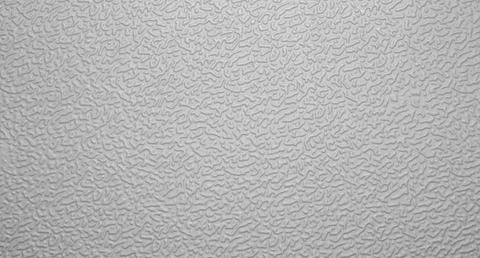 The texture of gray rough plastic.The background is made of gray plastic. Stock Photos