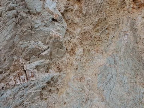 The texture of the gray stone of different structures. Photo surface of the r Stock Photos