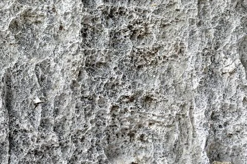 Texture of gray stone surface with rough natural patterns and depth Stock Photos