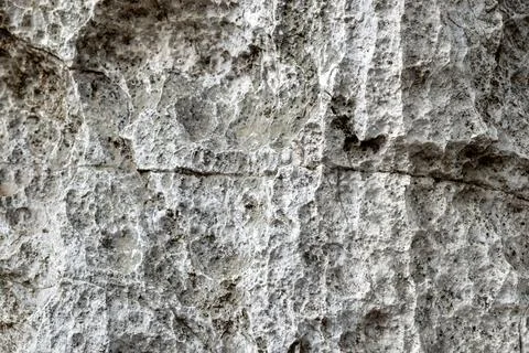 Texture of gray stone surface with rough natural patterns and depth Stock Photos