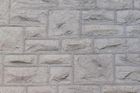 Texture of gray stone wall background Stock Photos