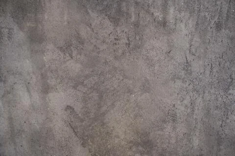 The texture of a gray stone wall with lightened spots. An overlay for your Stock Photos