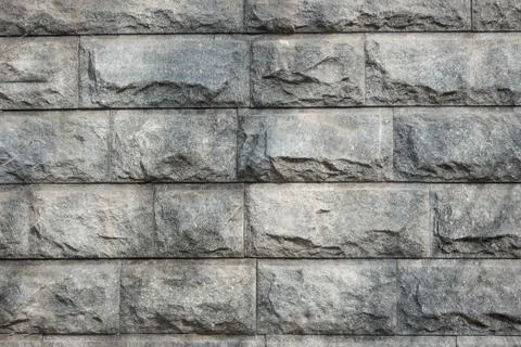 Texture of a gray stone wall. Stock Photos