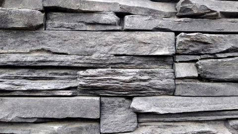 Texture of gray stone wall shape background. the wall is made of various rect Stock Photos