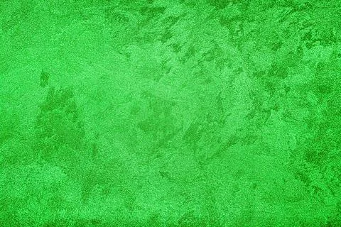 Texture of green decorative plaster or concrete. Abstract grunge background. Stock Photos