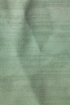 Texture of green fabric made of polyester Stock Photos
