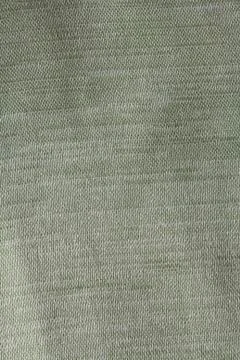 Texture of green fabric made of polyester Stock Photos