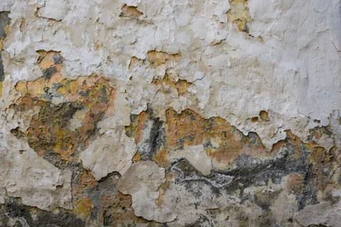 Texture of grey cement plaster with cracked paint Stock Photos