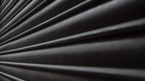 Texture of a grey-coloured metal shutter Stock Photos