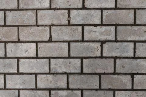 The texture of the grey paving slabs Stock Photos