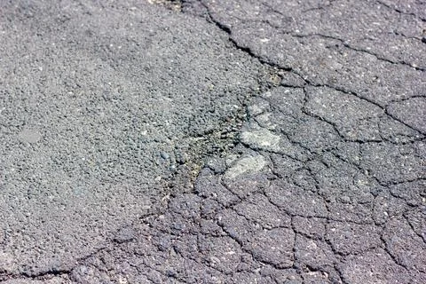 Texture of the ground, cracked asphalt texture Fotos de archivo