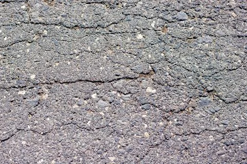 Texture of the ground, cracked asphalt texture 스톡 사진