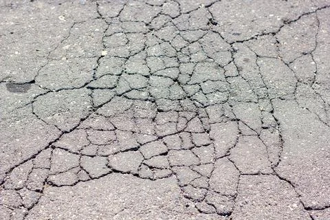 Texture of the ground, cracked asphalt texture 写真素材