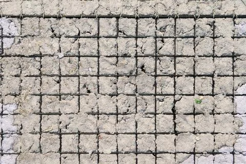 Texture of Handmade Paper on a black metal grid Stock Photos