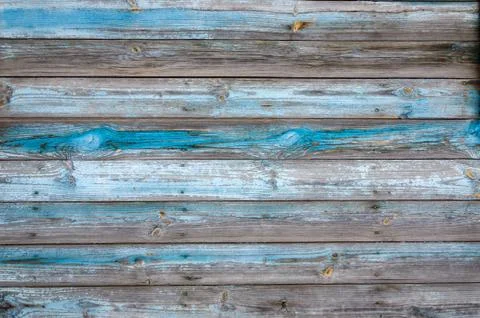 Texture horizontal wood cladding house with shabby blue paint. Stock Photos