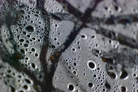 Texture of humidity water drops macro from under the plastic material. Stock Photos