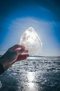 Texture of ice on the river, broken into cracks, Stock Photos