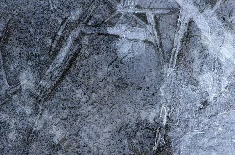 Texture of the ice in side sun light. Stock Photos