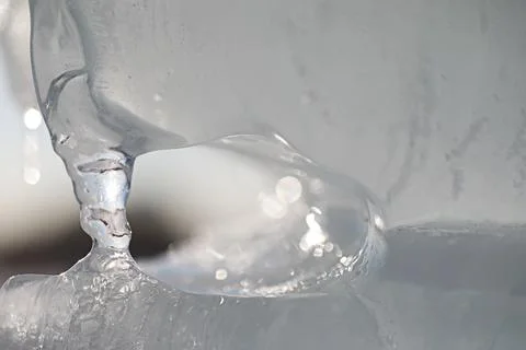 Texture of ice on a spring day under the sun. Stock Photos