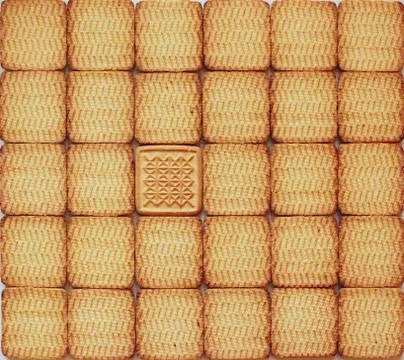 Texture from identical pastry with single unique Stock Photos