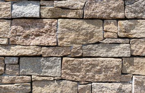 Texture from imitation stones, modern cladding of the exterior wall 写真素材