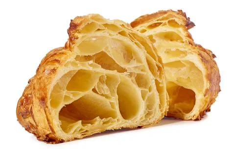 Texture of the inside of a half-cut croissant on a white background Stock Photos