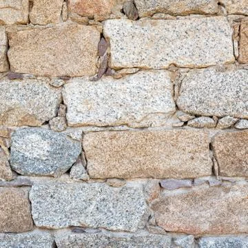 Texture of an irregular stone wall. Background. Stock Photos