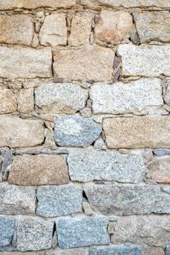 Texture of an irregular stone wall. Background. Stock Photos