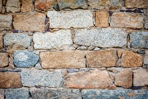 Texture of an irregular stone wall. Background. Foto stock