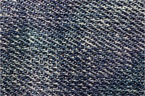 Texture jeans fabric. Stock Photos