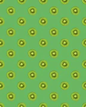 Texture. Kiwi repeating seamless pattern on green background. Kiwi is cut. Stock Photos