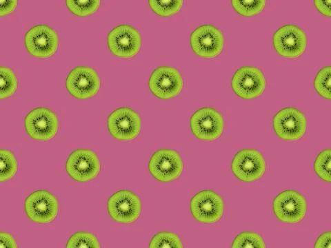 Texture. Kiwi repeating seamless pattern on purple background. Kiwi is cut. Stock Photos