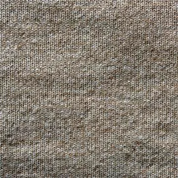 .texture of the knitted fabric as a background Stock Photos