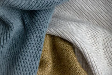 Texture of knitted fabrics of three types Stock Photos
