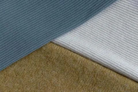 Texture of knitted fabrics of three types Stock Photos