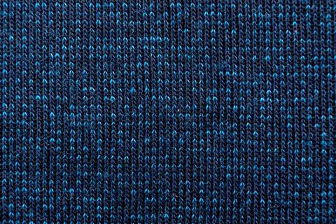 The texture of the knitted material is blue. Knitting. fabric blue Stock Photos