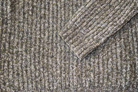 Texture of knitted wool sweater close-up, horizontal format Stock Photos