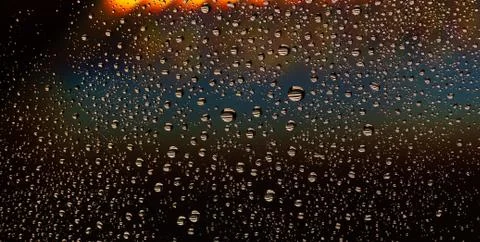 Texture of large and small drops of water on a matte surface Stock Photos