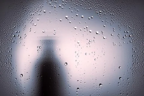 Texture of large and small drops of water on a matte surface Stock Photos