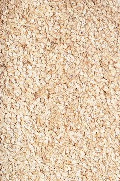 Texture of large oatmeal on a white background Stock Photos