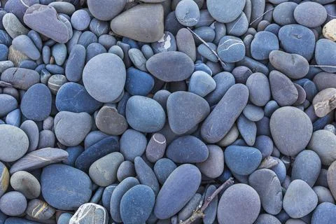The texture of large river pebbles. Will match the background Stock Photos
