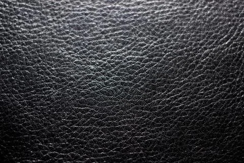 Texture leather black close up background top view Stock Photos