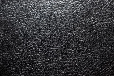 Texture leather black close up background top view Stock Photos