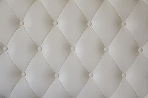 The texture of the leather upholstery of the back of the sofa Stock Photos
