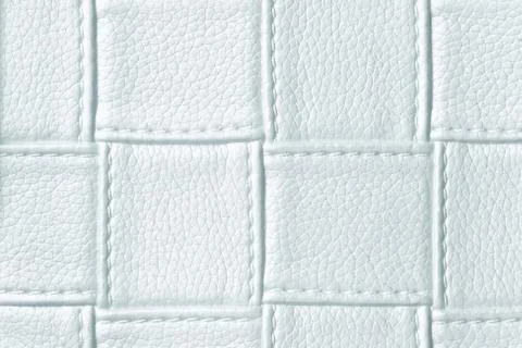 Texture of light blue leather background with square pattern and stitch, macr Stock Photos