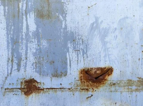 The texture of a light colored hard sheet with rust Stock Photos